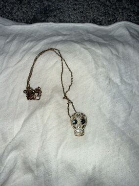 Gold-Tone Skull Pendant Necklace with Black Crystal Eyes